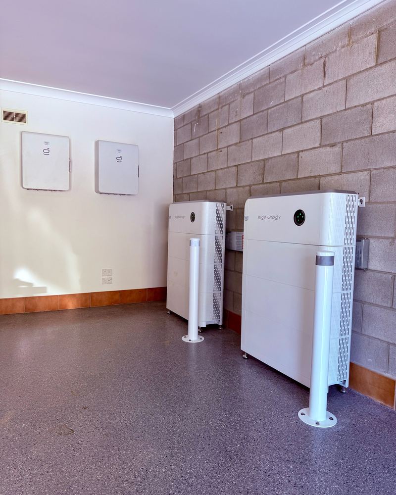 Twin Sigenergy SigenStor stacks with backup gateways in a finished plant room